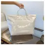 Bolsa de gelatina portátil para mujer, estilo nuevo, bolsa simple, gran capacidad, bolsa de mano para el trabajo, estilo simple, bolsa ligera, transfronteriza