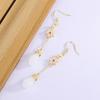 Aretes Largos de Borla con Flor de Magnolia Blanca Hetian con Incrustaciones Retro Estilo Étnico Femenino Aretes de Moda Elegantes