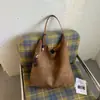 Bolsa de mano transfronteriza para mujer, bolsa de gran capacidad para el trabajo, bolso de hombro versátil y sencillo para otoño e invierno, bolsa de compras