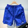 Novos Shorts de Trabalho Masculinos de Secagem Rápida para o Verão, Calças Esportivas Versáteis Finas de Caimento Solto, Marca da Moda com Bolsos Grandes, Shorts de Cinco Pontos