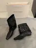 Botas de mujer de cuero suave con hebilla retro estilo páramo 2026 nuevo modelo punta fina botas cortas elegantes botas de montar a media pantorrilla de moda