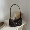 Nuevo bolso bandolera de estilo coreano de alta moda para principios de otoño de 2026, bolso de hombro elegante, bolso simple para el antebrazo para el día a día, bolsos de mujer al por mayor