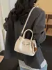 Bolsas Pequeñas de Moda Transfronterizas para Mujer 2026 Nuevo Bolso Cubo Versátil Bolso de Mano Super Popular Bolso Cruzado de Hombro