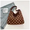 Bolsa de terciopelo de nicho de comercio exterior para mujer, nuevo modelo 2026, bolso de hombro y axila de gran capacidad, bolsa de mano tote versátil casual para el día a día
