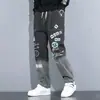 Jeans tipo Jogger Holgados de Dibujos Animados de Moda para Hombre 2026 Verano Nuevo Estampado de Letras Drawstring Harem Pants de Ins