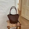 Bolso tejido de patrón único para mujer, nuevo bolso de mano de alta gama vintage otoño 2026, bolso de hombro y bandolera tipo cubo