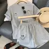 Conjunto Esportivo Casual de Shorts de Manga Curta com Estampa de Rosto Sorridente Transfronteiriço Feminino Emagrecedor Solto Estilo Coreano Conjunto de Duas Peças Estudante Tendência