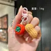 Llavero creativo de caqui personalidad simulación de caqui bolsa de cacahuete colgante pequeño venta al por mayor decoración divertida para coche