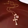 Nuevo collar de corazón de circón, diseño de nicho moderno, cadena de clavícula cruzada de lujo ligero, accesorio femenino moderno y versátil