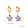 Pendientes de estrella de cinco puntas con diamantes huecos de lujo y luz de alta gama, muy vendidos en acero inoxidable, pendientes de flor de circonita de color mariposa