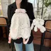 Mochila de estilo coreano ins con lunares para mujer, nuevo modelo 2026, mochila de conejo de orejas largas, bolsa escolar pequeña compacta y linda