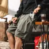 Shorts de trabajo blancos retro americanos para hombre, marca de moda de verano, bolsillos grandes, corte holgado, shorts casuales funcionales para exteriores para hombre