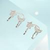 Pendientes de clip de oreja de estrella y luna refinados de alta calidad para mujer, pequeños pendientes de hebilla de estrella de cinco puntas con diamantes frescos sin agujeros para las orejas.