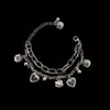 Pulsera Unisex de Aleación Oscura de Doble Capa con Colgantes de Oso, Corazón, Cara Sonriente y Cruz, Estilo Minimalista Ins Europeo y Americano