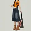 Elegantes y estilizados jeans cropped de estilo americano, un nuevo diseño para ropa de trabajo, con un corte retro y versátil de cintura alta y pierna ancha