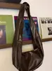 Bolso de Mano tipo Dumpling de Cuero Encerado de Nicho 2026 Nuevo Retro para Viaje y Uso Diario Hombro Cruzado Gran Capacidad Bolso de Cuero Suave para Mujer