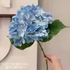 Flores artificiales azul púrpura estilo pintura al óleo jardín Monet libro rojo pequeño combinación de colores belleza Chen camino de boda fila delantera flores al por mayor
