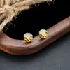 Pendientes Dorados Montaña del Sol con Luz Transfronteriza para Hombres, Pinzas para Orejas de Diseño Moderno y Tendencia para Mujeres, Accesorios Sencillos, Pendientes de Moda