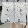 Atacado Novo Conjunto de Colares de Três Peças, Colar Estilo Lua e Pérola, Corrente de Clavícula Fashion, Estilo Feminino Tendência Personalizado Atacado