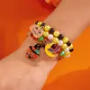 2025 Novo Elemento de Halloween Abóbora Fantasma Pulseira Design Feminino Colorida Elástica com Contas Pulseira Atacado