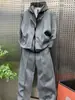 Otoño e invierno retro americano chaqueta con capucha de cárdigan de dos piezas de imitación con doble cremallera para hombre, moderna, holgada, pantalones largos, traje casual