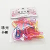 Sj926 Estilo coreano fuerte tirón continuo desechable banda de goma para el pelo de niños banda de goma colorida puesto de Yiwu 2 yuanes al por mayor