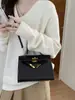 Bolso de mano texturizado con patrón de cocodrilo para mujer, nueva colección 2026, bolso de estilo Kelly, de nicho y lujoso, adecuado para el trabajo y el uso casual, se puede llevar como bolso de hombro o bolso cruzado