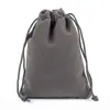 Bolsa de franela al por mayor de fábrica con cordón negro a prueba de polvo para joyería, bolsa de franela de almacenamiento para empaque de joyería multicolor