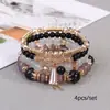 Pulsera de Cristal con Perlas de Vidrio Estilo Retro Europeo Cruzada Set de 4 Piezas Pulsera de Perlas Vajra Multicapa Apilable