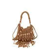 Bolso tejido para mujer, nuevo modelo de verano 2026, nicho y súper popular, bolso de hombro para el trabajo, bolso cruzado con borlas, bolso de playa de paja