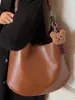 Retro Gran Capacidad Color Sólido Popular 2025 Casual Otoño Nueva Textura Casual Casual Bolso de Hombro Tote Bolso Tote