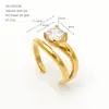 Anillo abierto retorcido de un solo diamante estilo europeo y americano, anillo de moda simple de cuatro puntas con circonita redonda de doble capa, joyería de moda de nicho para mujeres commuters