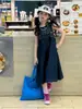 Ropa Infantil Floral y Xun Vestido de Tirantes para Niña 2026 Verano Nuevo Vestido de Tirantes de Mezclilla Azul Lavado Dulce Fresco Tendencia Retro