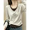 Camiseta de Manga Larga de Algodón Puro con Cuello en V Falso Dos Piezas Diseño con Sentido de la Moda Chic Elegante Fruncido en la Cintura Lateral Top Adelgazante Otoño Temprano