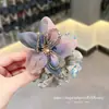 Diadema de flor de malla con pedrería impresa azul-morada para la parte posterior de la cabeza alta elasticidad duradera accesorio para el cabello para atar el cabello coleta alta estilo nuevo