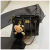 Bolso de Mano Retro Sencillo Bolso Cubo para Mujer 2026 Nuevo Estilo Bolso Tote con Cadena de Rombo Bolso de Hombro Único Bolso Cruzado Lujo Ligero