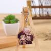 Llavero Zhilang de carbón con animación de espada extintora de fantasmas para puerta de cocina, mochila coreana, adornos colgantes, cinta colgante