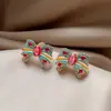 Brincos de Tarraxa com Laço Colorido Microcravejados de Zircônia em Cobre Banhado a Ouro 18K Acessórios de Brincos Versáteis e de Personalidade