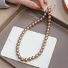 Collar de perlas de color mixto para mujer beizhu Shijia cadena para la clavícula otoño e invierno Maillard Nuevo cadena de suéter de lujo ligero gradiente avanzado