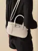 Moda Primavera 2026 Versátil Bolsa de Mão Elegante e Moderna Bolsa de Ombro Transversal com um Toque Vintage de Alto Padrão