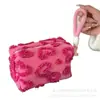 Neceser en stock, bolso de peluche, nuevo bolso de maquillaje transfronterizo, bolso peludo, bolso para teléfono con forma de corazón, bolso de mano portátil