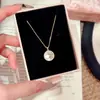 Design Estilo Francês com um Anel de Estrela de Oito Pontas e Colar de Concha Natural, um Colar Exclusivo de Luxo Leve e de Alta Qualidade