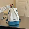 Mochila esportiva estilo coreano, corte relaxed, com blocos de cor, uma opção versátil e casual para casais, perfeita para atividades ao ar livre, trilhas e acampamento; uma mochila leve