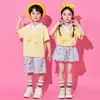 Traje de porrista para el Día del Niño para estudiantes de primaria, conjunto de uniforme de clase para el día del deporte escolar, disfraz de lunares con falda corta para jardín de infantes