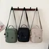 Bolso Pequeño Cuadrado de Tela de Nylon Impermeable Ligero Multicapa Transfronterizo Nuevo Bolso de Hombro Casual Multibolsillos Bolso Cruzado de Gran Capacidad