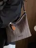 Bolso de axila retro de alta gama para mujer, nuevo bolso de hombro tipo cubo versátil de moda de verano para el día a día