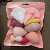 Traje de Huevo de Belleza Combinado Transfronterizo Mini Triángulo Dedo Borla de Polvo Flocado Cojín de Aire Maquillaje Huevo Esponja Huevo de Color Huevo de Maquillaje