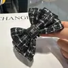 Nuevo Estilo Francés Tela de Cuadros de Alta Calidad Pinza de Plátano Moño Estilo Pequeño Chanel Corea del Sur Dulce Elegante Accesorios para el Cabello