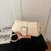 Bolso de axila de moda femenina transfronterizo, diseño de nicho, bolso para el trabajo, nuevo bolso versátil de hombro cruzado para mujer Otoño 2026