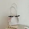 Bolsa de luxo leve de nicho com textura tecida feminina nova moda de verão bolsa de ombro única bolsa tote de grande capacidade